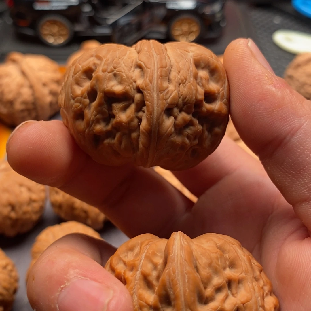 悲***肠文玩核桃精品对元宝46全品