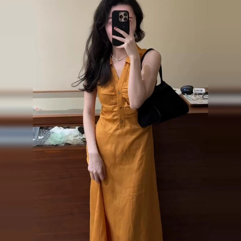 法式高级感纯欲黄色v领连衣裙子夏女显瘦设计感polo长裙3270