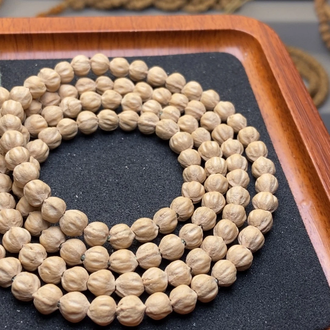 碑***）手串柏香籽/百香籽