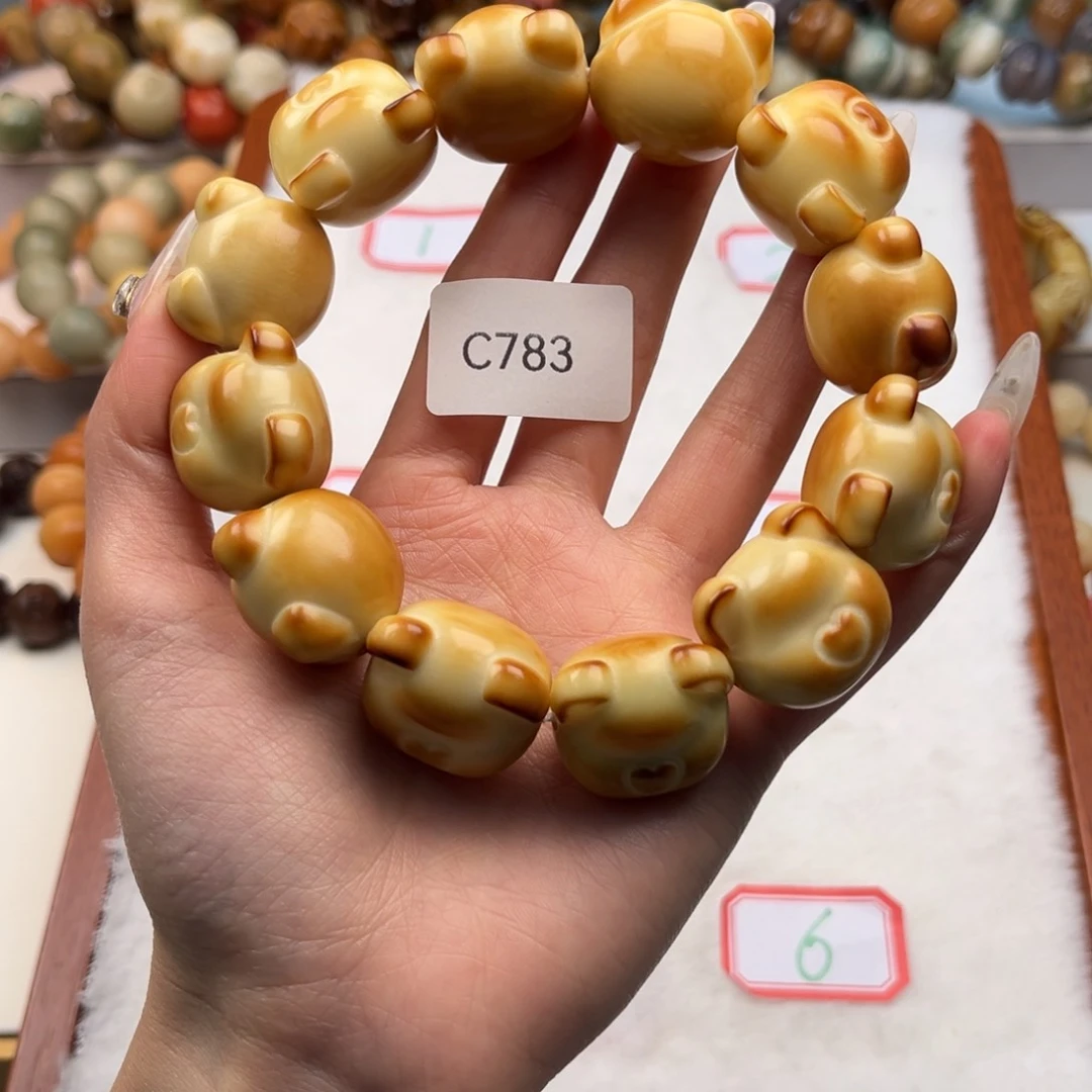 菩提根/象牙果手串蓝****囡c783通货爱心熊20mm一串