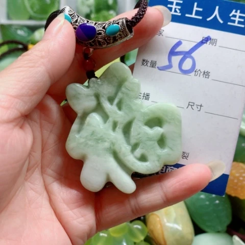 用***4未镶嵌蛇纹石玉手把件