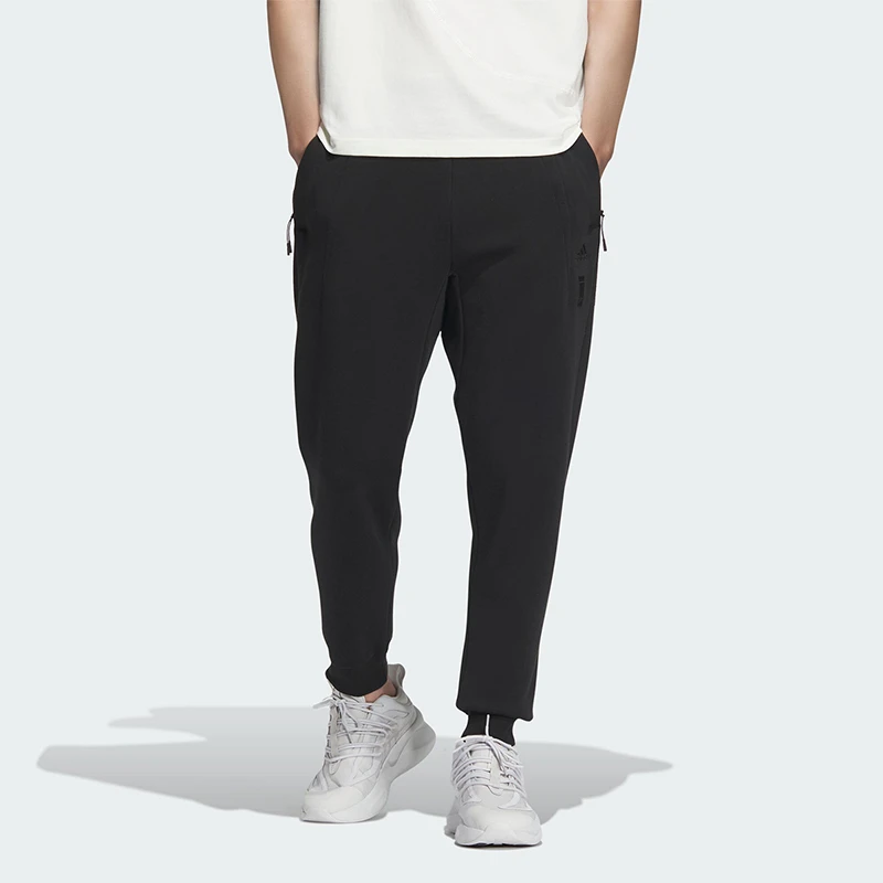 Adidas/阿迪达斯~春季男士宽松休闲运动束脚长裤JE6668