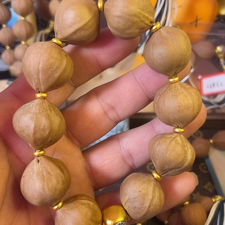 金***宇手串橄榄核梅林铁