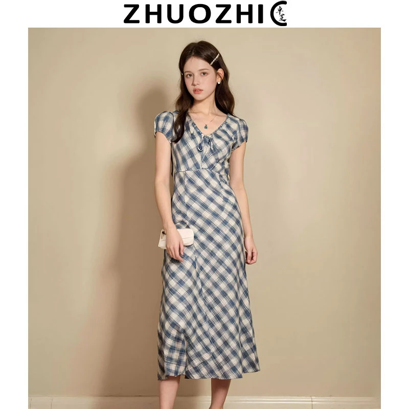 [卓芝]法式设计感泡泡袖蓝色格纹连衣裙2025夏季新款收腰显瘦裙子