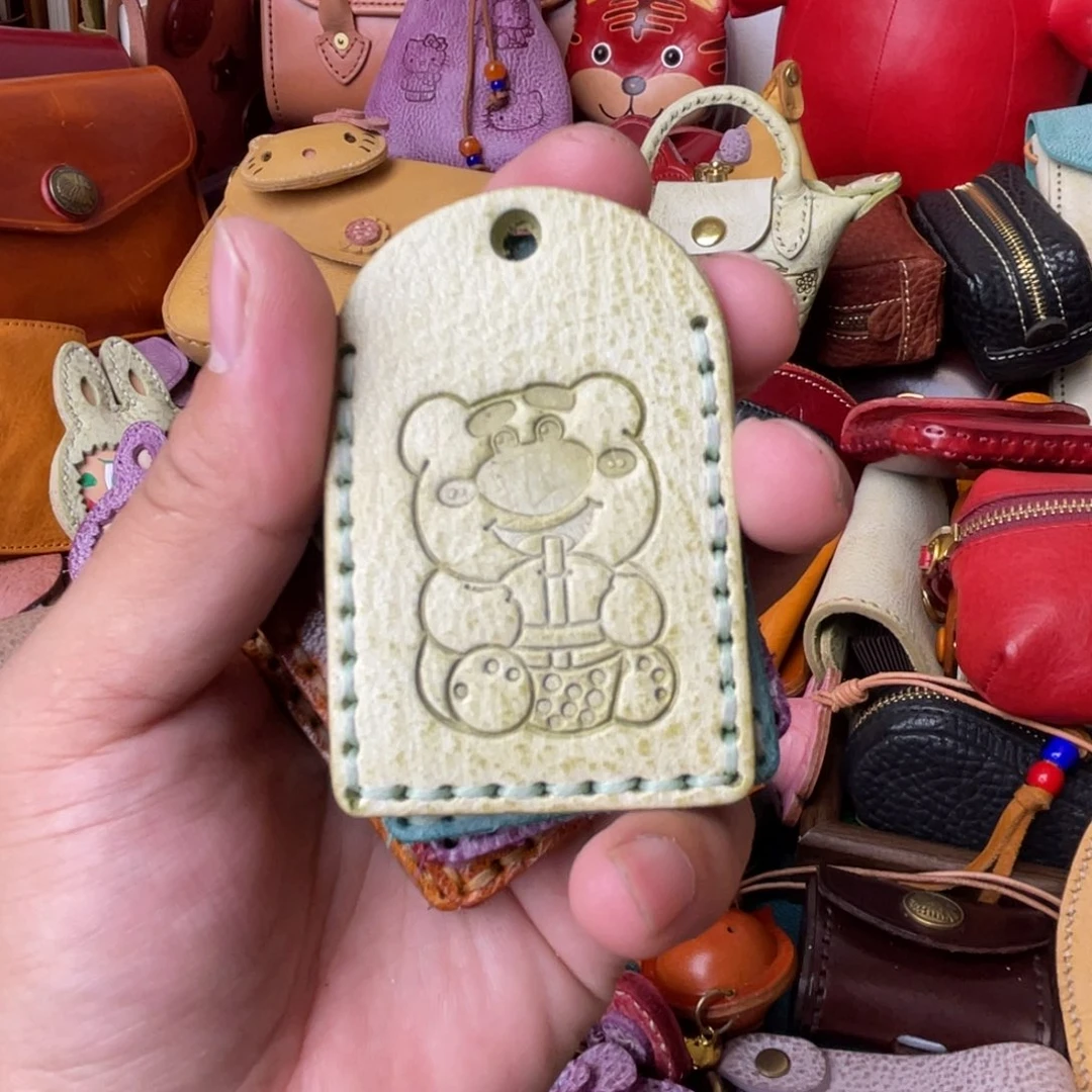 钛合金带子款头层牛皮