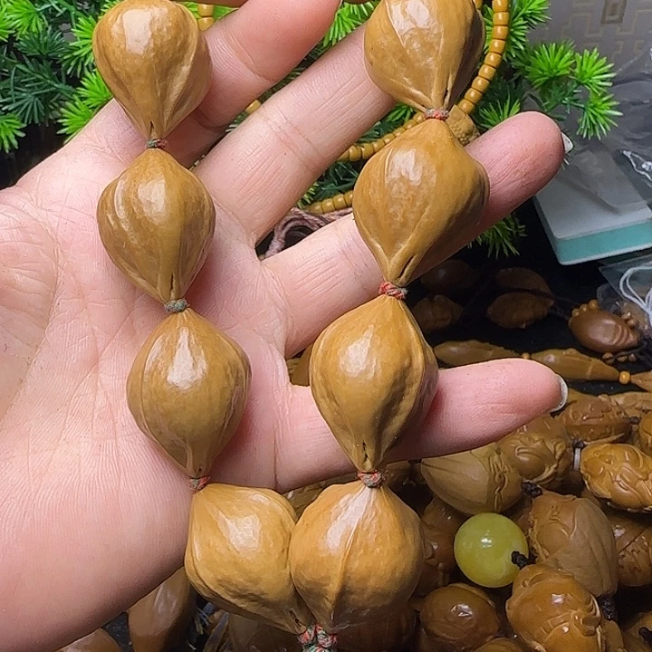 一***悠橄榄核雕刻手串素