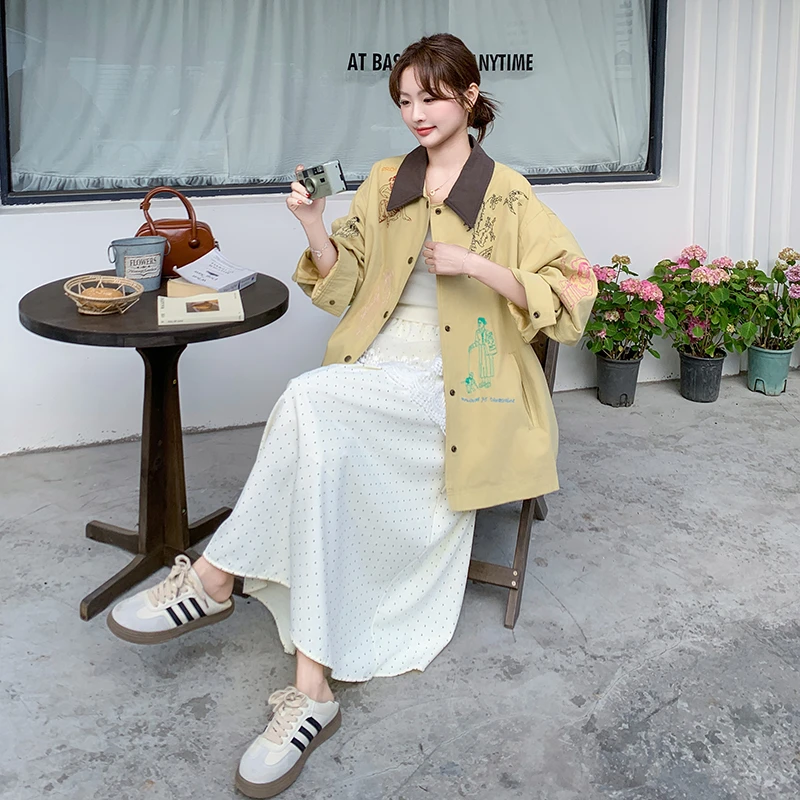 韩版黄色拼接刺绣宽松外套女春秋2025新款时尚印花设计感风衣上衣