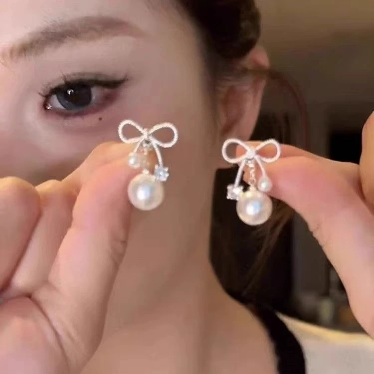 铜合金耳饰  蝴蝶结珍珠耳钉女高级感轻奢耳环设计感气质百搭耳饰