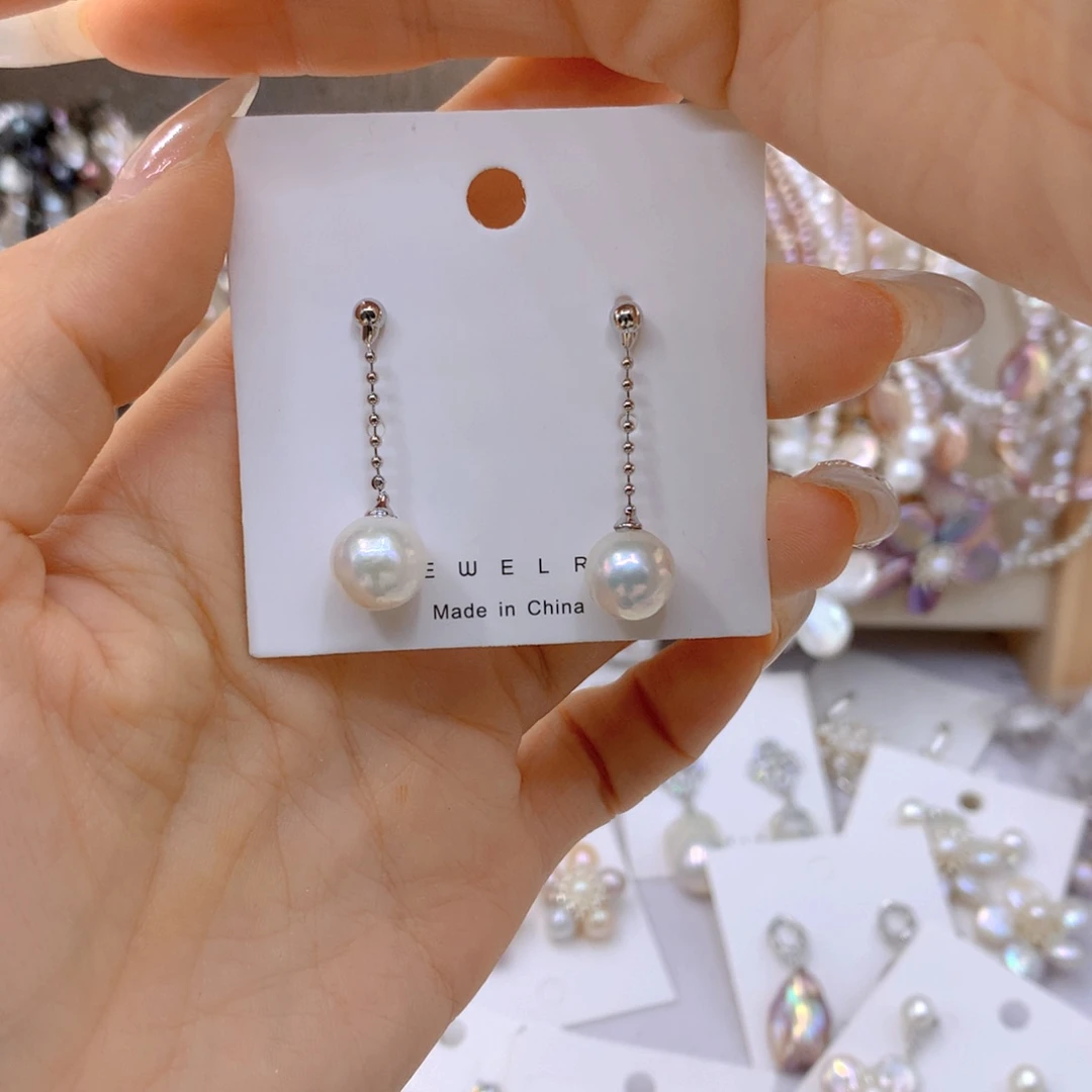 淡水珍珠耳饰银S925镶嵌蒲**?