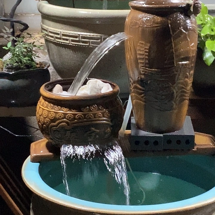 一高一低两个流水罐一个40瓦一个弯头