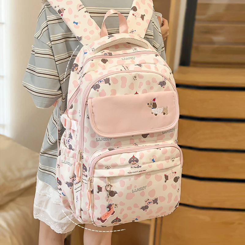 高颜值减负书包女初中生小学生3-6年级新款大容量可爱旅行双肩包