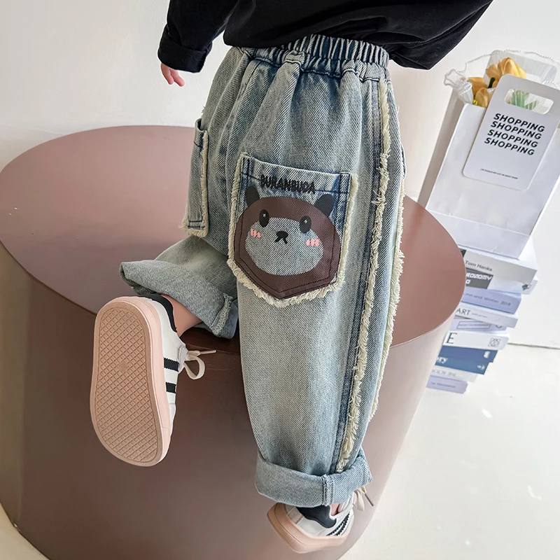 女童牛仔裤2025春秋新款中小童卡通毛边软牛仔休闲裤男女宝宝裤子