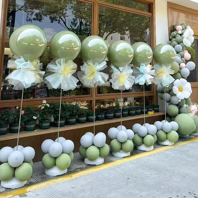 复古牛油果绿气球立柱路引气球链拱门商场服装店开业活动场景布置