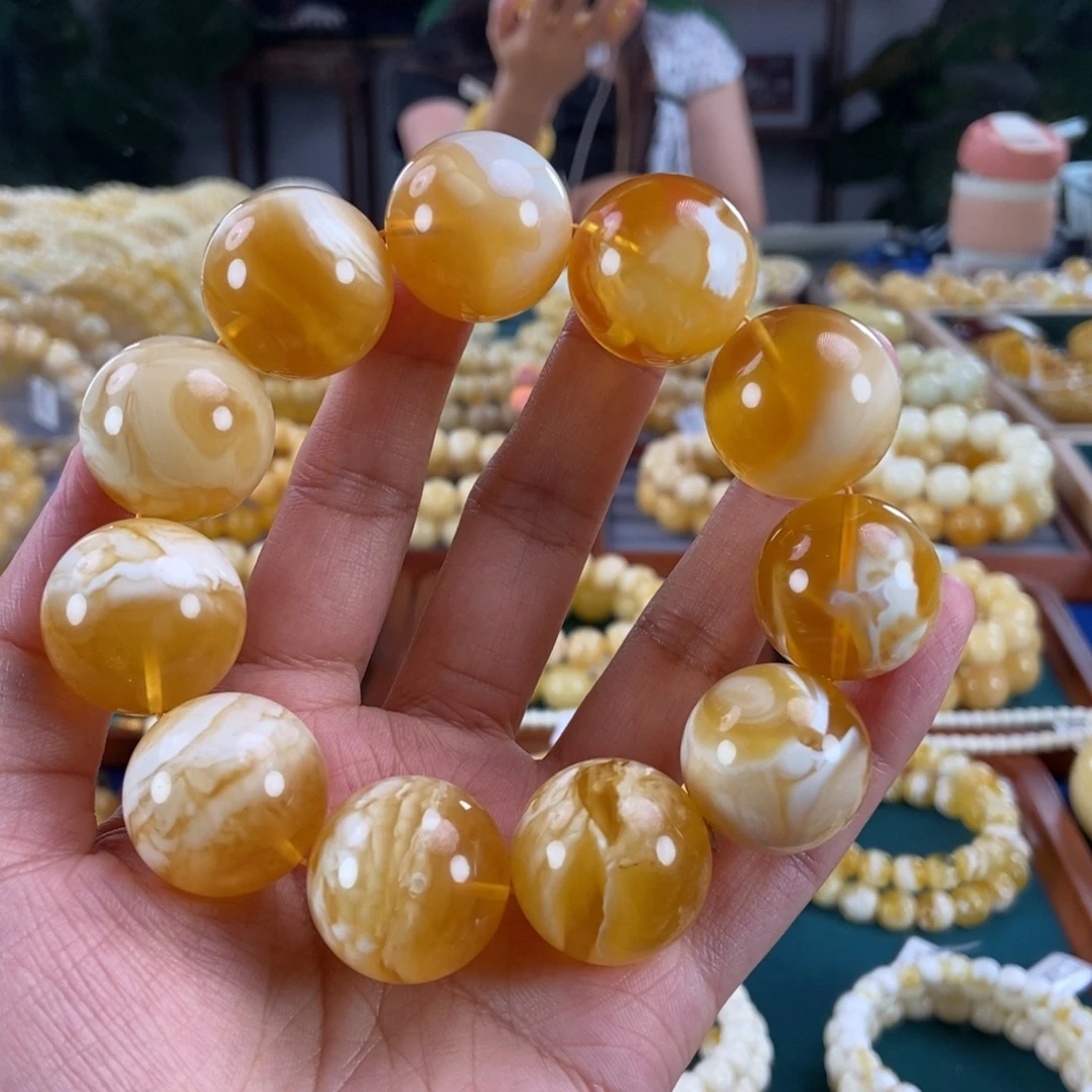 琥珀未镶嵌珠宝奇石23+金瓷白溶洞妖花圆珠77.9