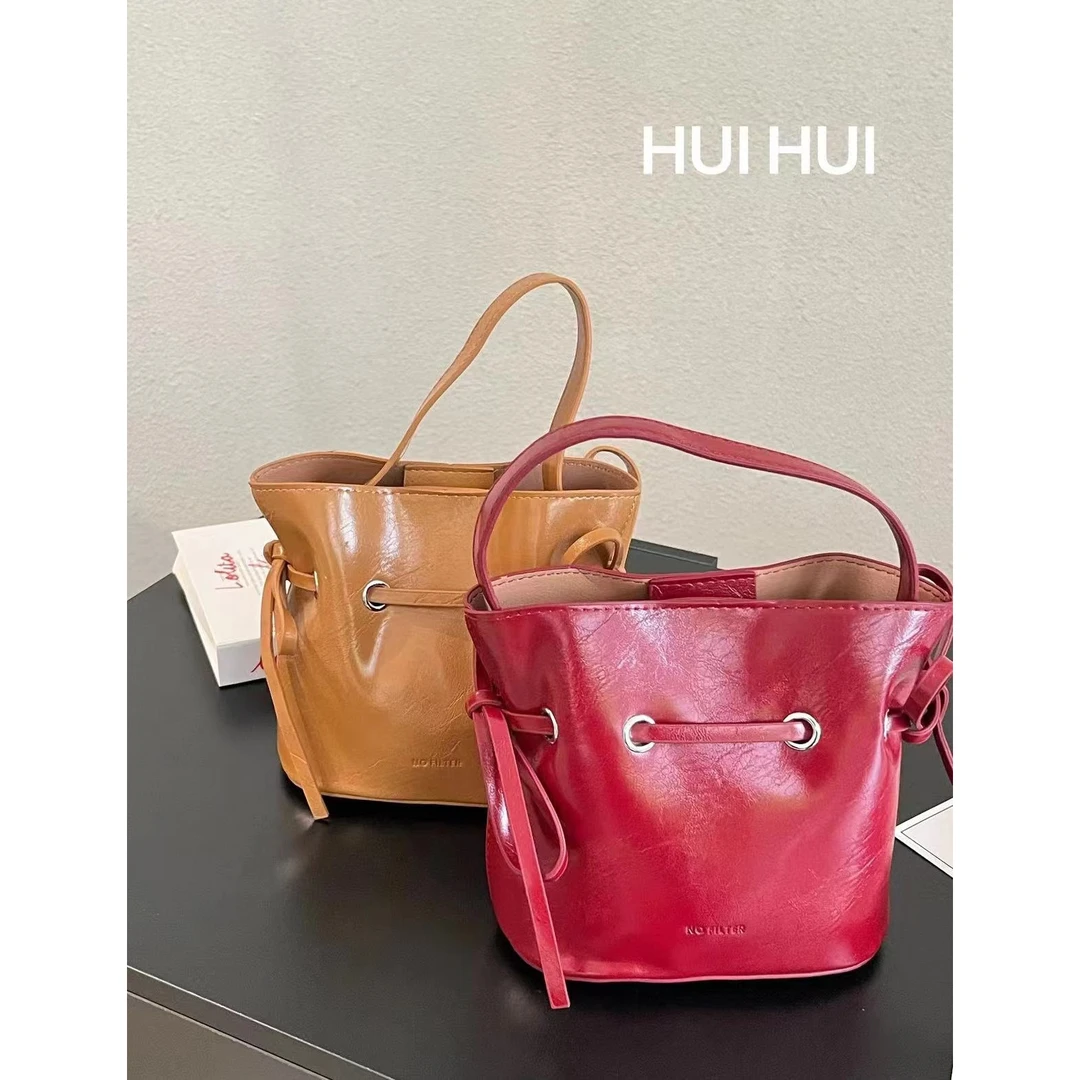 HuiHui【巧妙搭配】斜挎小包包水桶包多功能手提小拎包（A753)