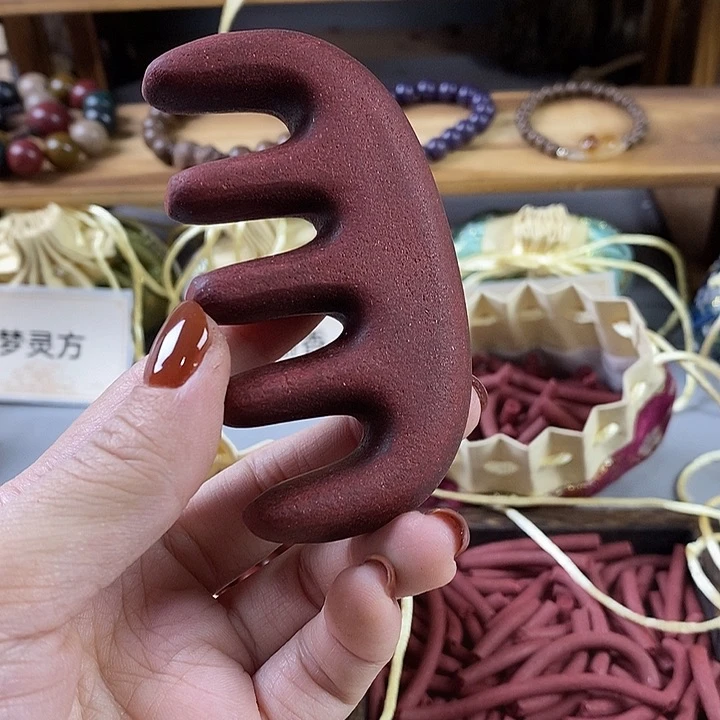 泥塑瑕疵花蕊夫人按摩梳