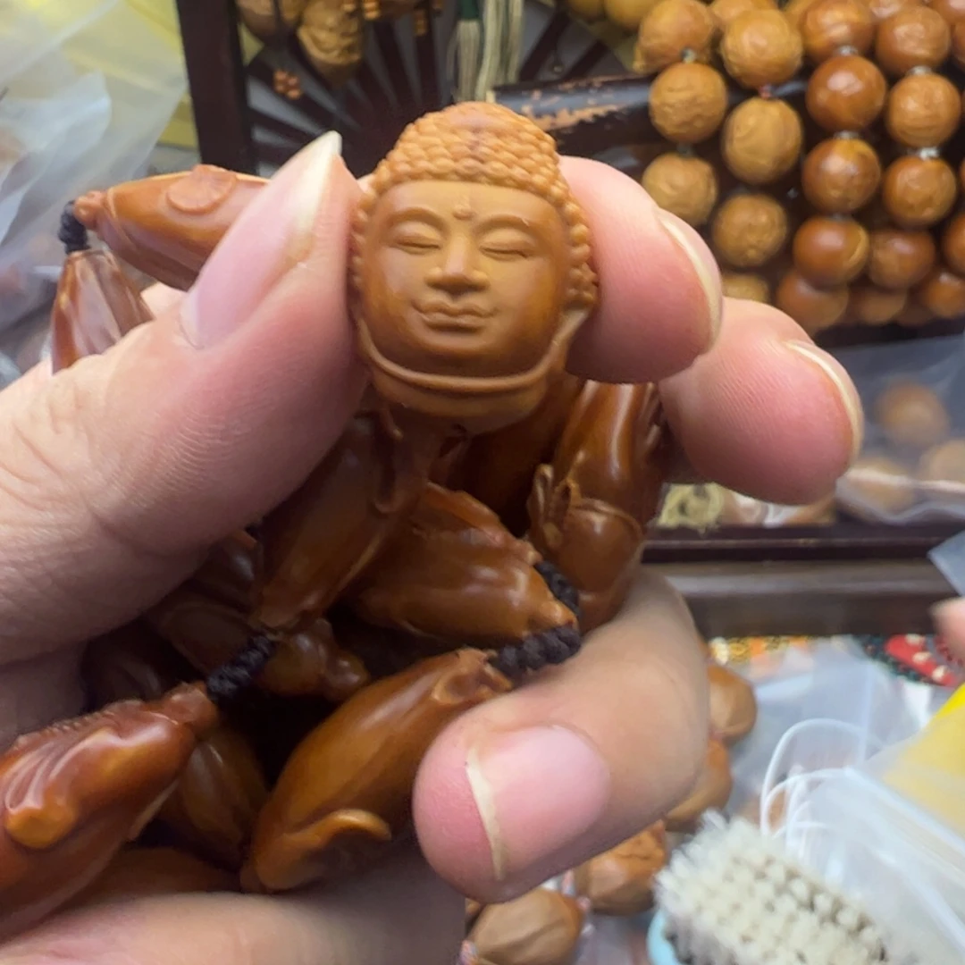 一***际橄榄核吊坠来咯据哭
