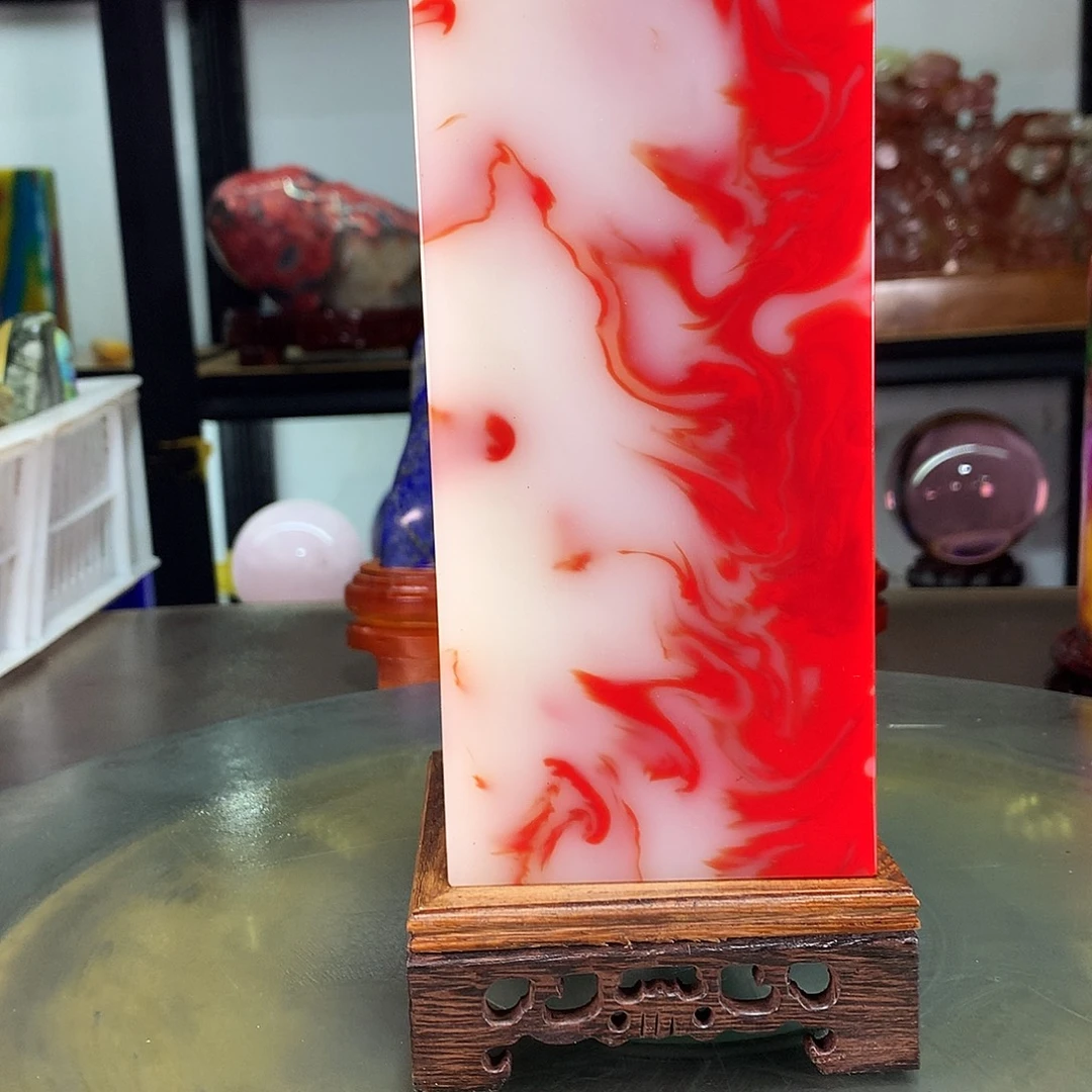 贤***厚石材巴西红宝摆件