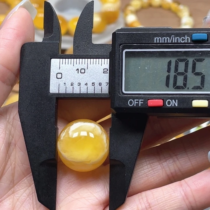 崔***杨未镶嵌琥珀裸石天然