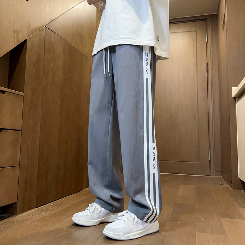 秋季薄款冰丝裤子男孩初中生2025新款休闲长裤青少年大童运动卫裤