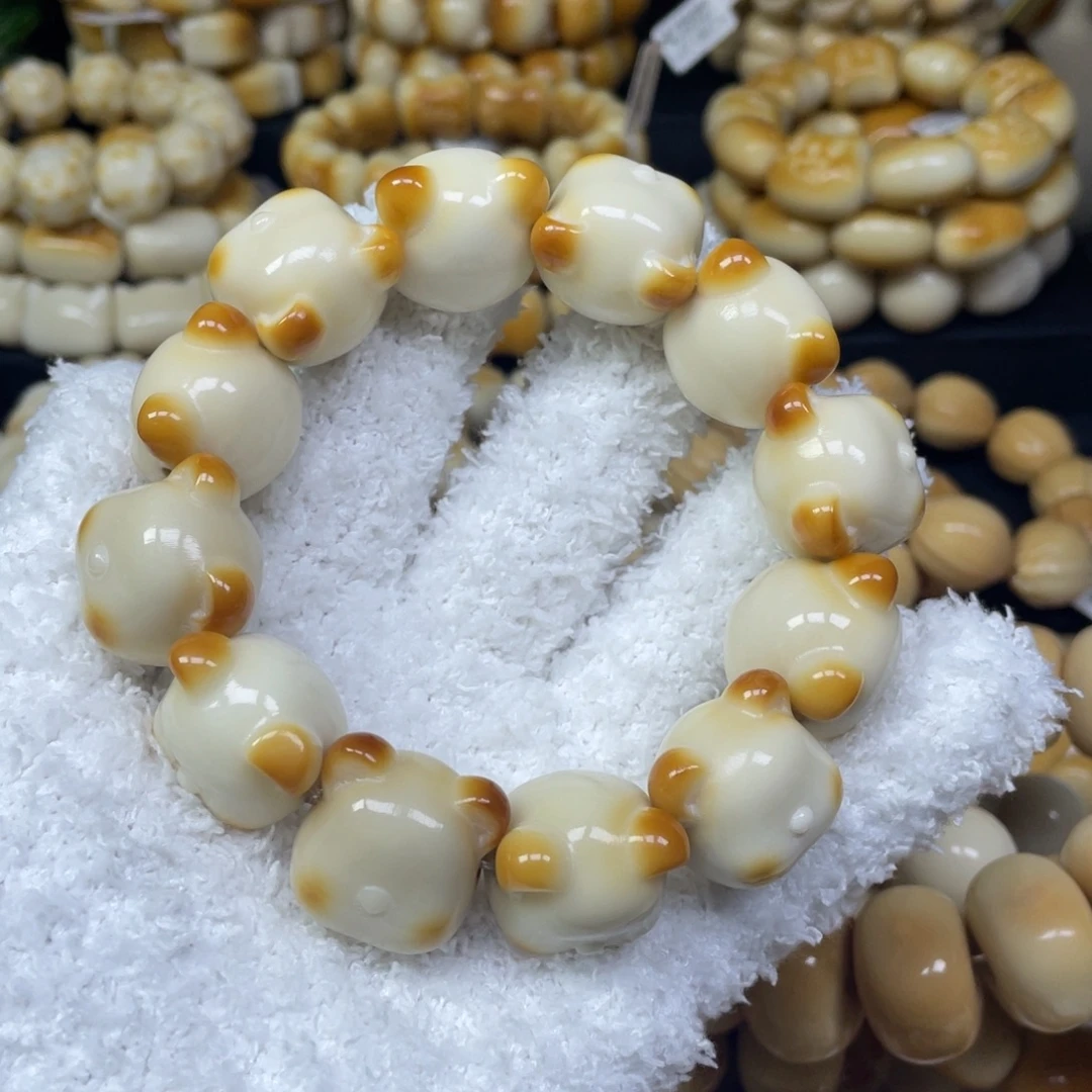 吊坠菩提根/象牙果10,22.5微瑕熊头