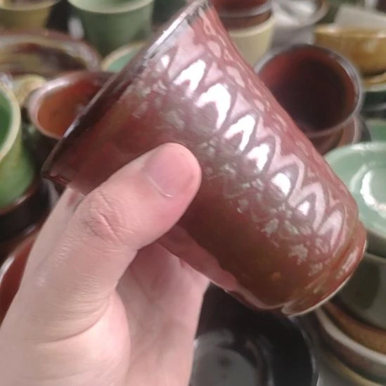 瓷片忒红柚文香杯有缩釉点