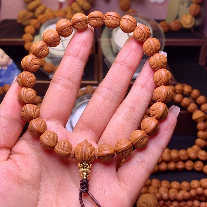 桃核手串听**?桃核手串