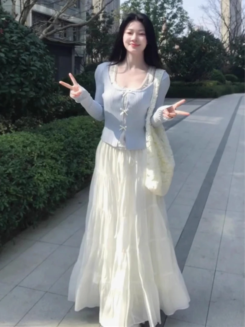 2025年春季纯欲假两件蝴蝶结蓝色针织开衫温柔高腰白色半身裙套装