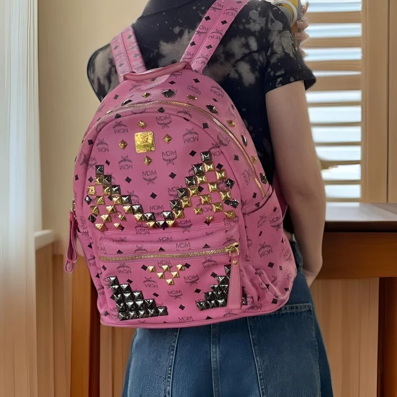 95新 MCM 32粉色中号双肩包/WJ12401031/1031