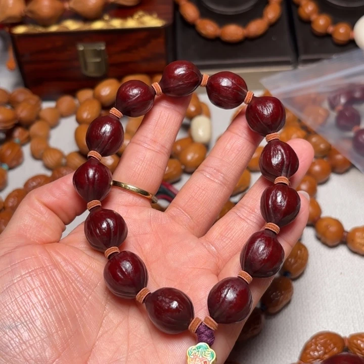 溜***的手串/手链橄榄核1.55紫皮