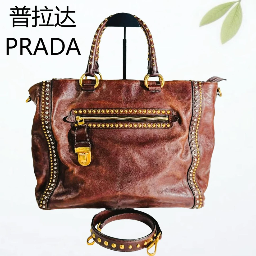 95新 Prada/普拉达 PRADA棕色铆钉手提单肩包G25401751底长38X27