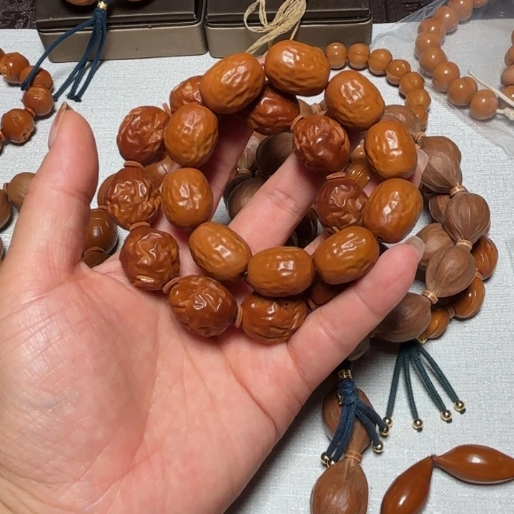 给***刀手串/手链橄榄核两条大枣