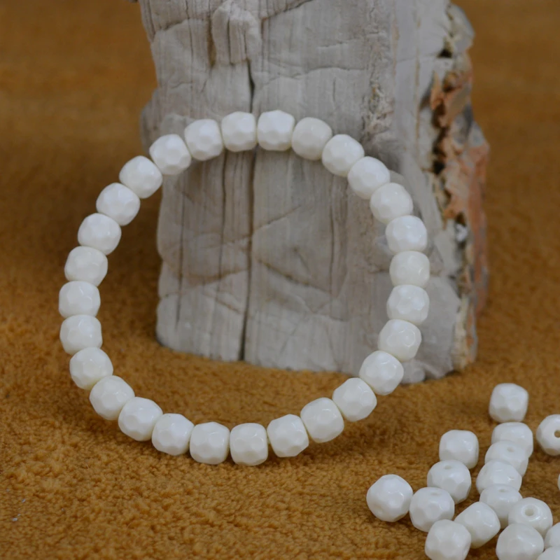 海南白玉菩提子雕刻骨瓷感手串