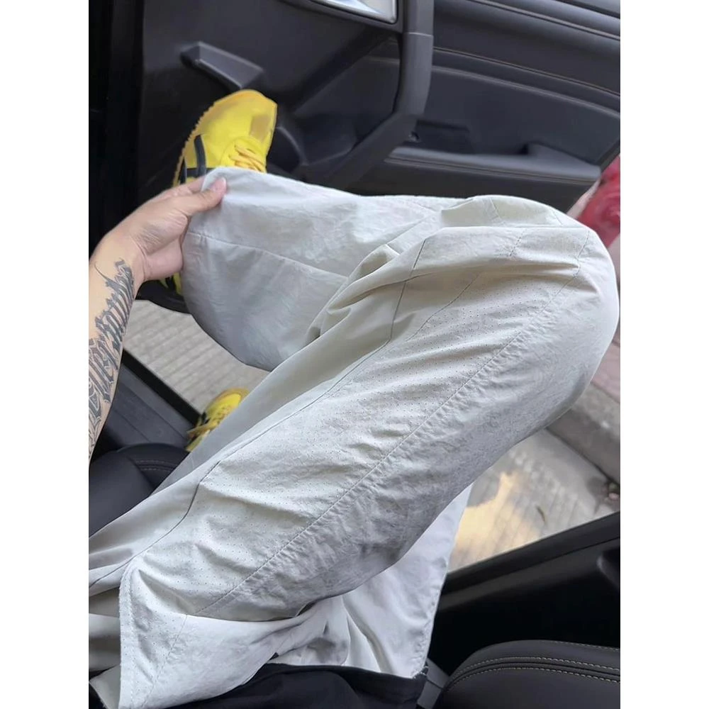 白色激光打孔速干裤男夏季薄款透气凉感冰丝裤户外运动直筒阔腿裤