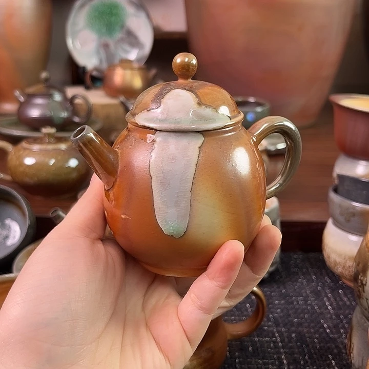 柴烧粉色窑汗龙蛋壶