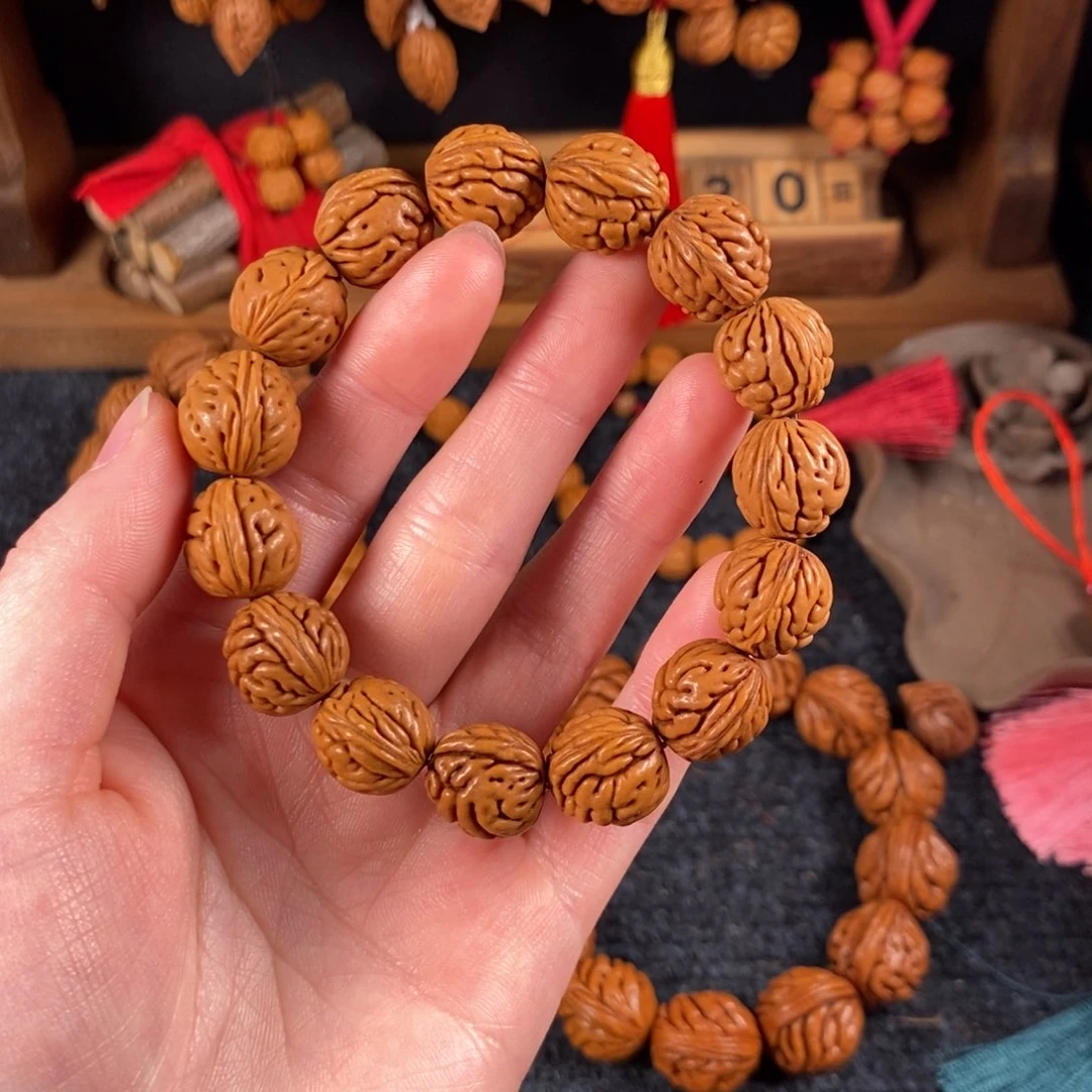 吊坠桃核桃枭手串