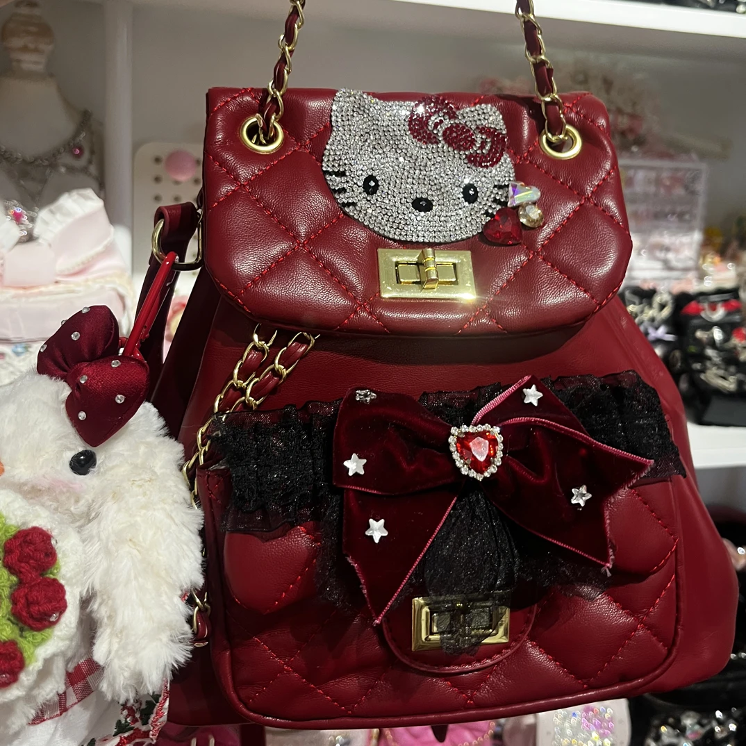 都市简约锁扣拉链款双肩包菱格百搭手拎包桶包