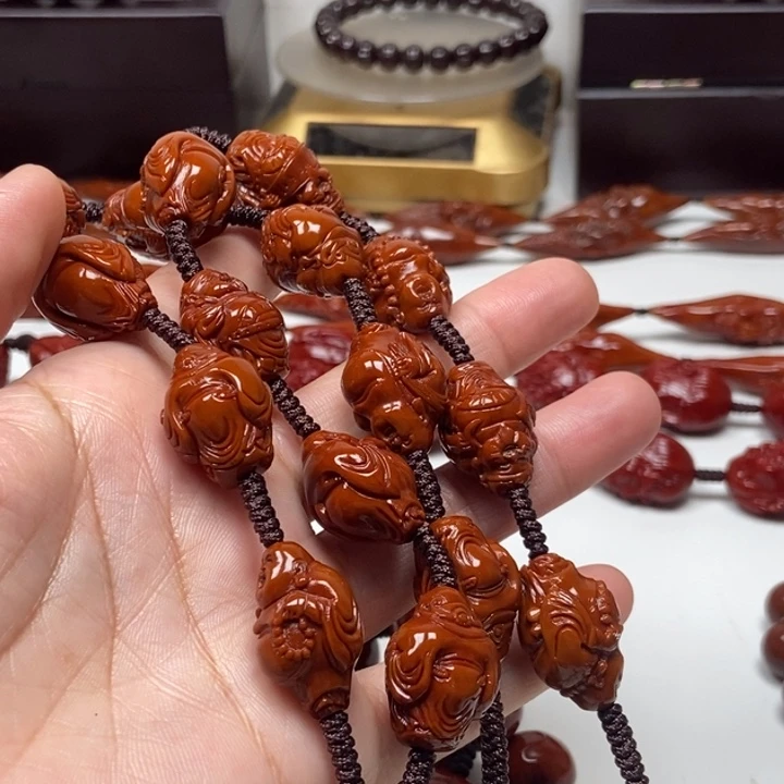 哥***访橄榄核吊坠橄榄核