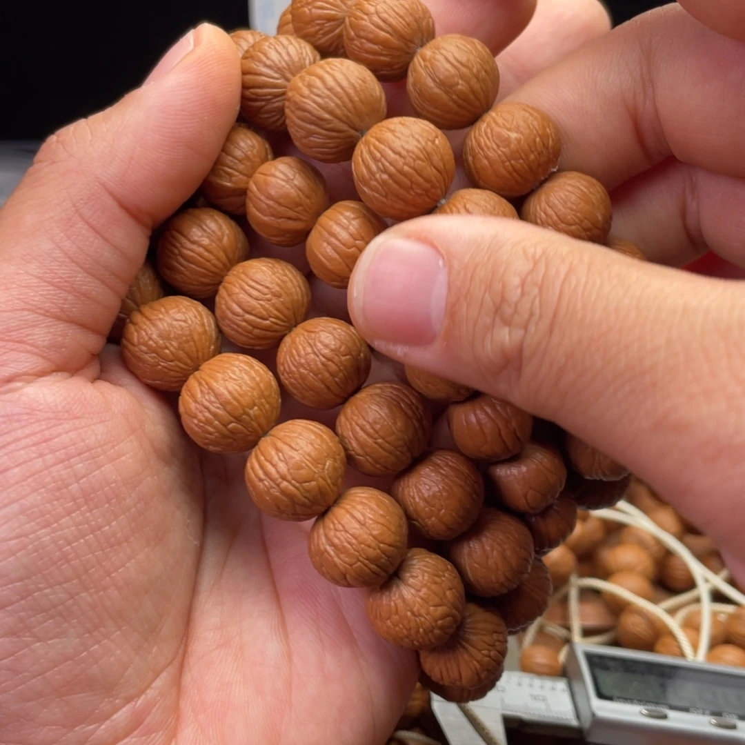 吊坠猴头核桃凤羽