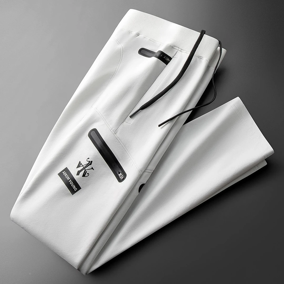 夏季时尚冰丝户外防风防水运动裤子软壳攀登冲锋裤男士修身休闲裤