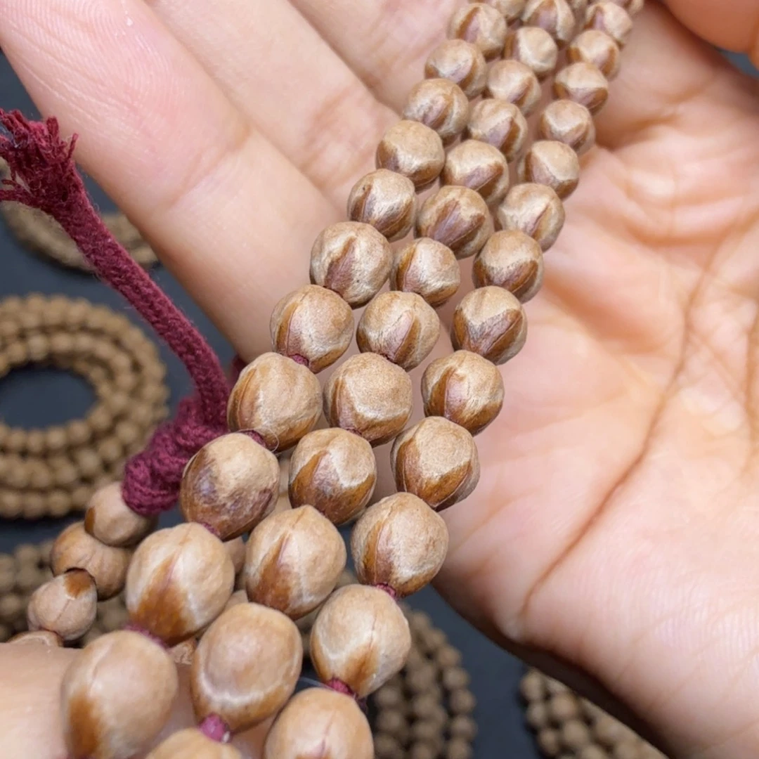 吊坠柏香籽/百香籽三花红牙莲花