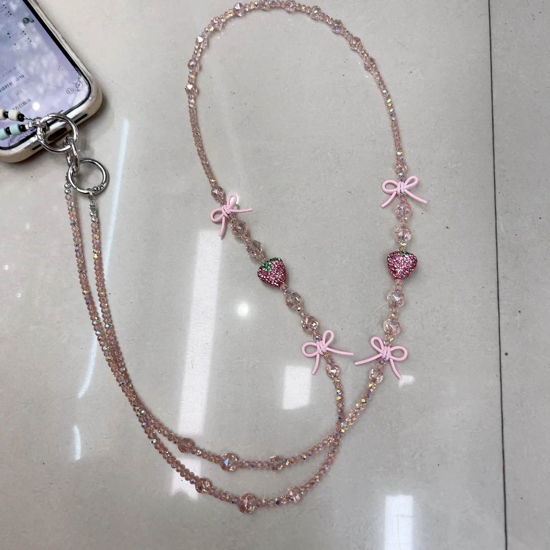 F18粉色没有烦恼草莓长手机链