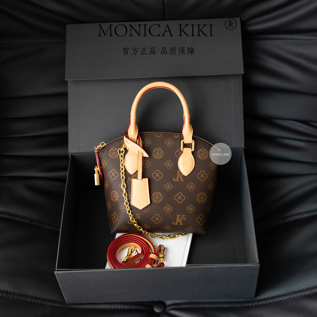 MONICA KIKI/莫妮卡奇奇2025经典复古小众百搭斜挎包贝壳包5862