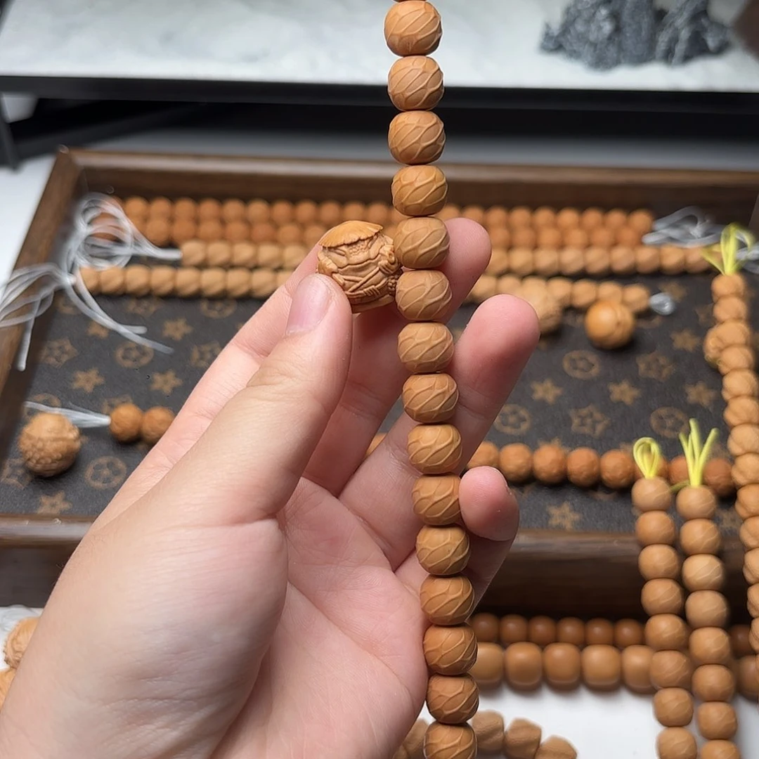 菩***影猴头核桃吊坠单科，龙吟