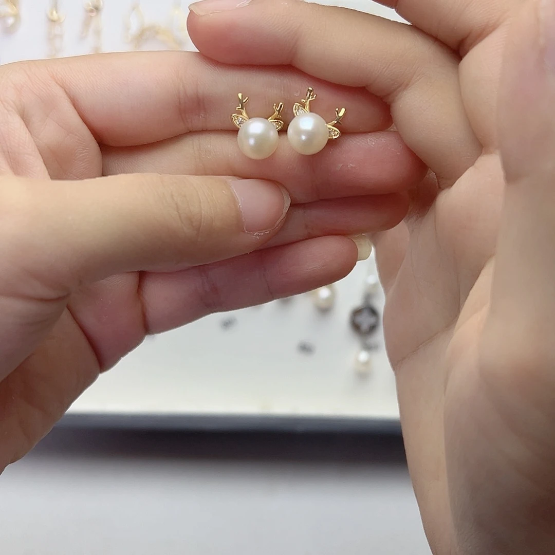 淡水珍珠银S925镶嵌耳饰