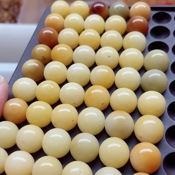 白玉菩提吊坠瑕疵15糖果圆珠57颗