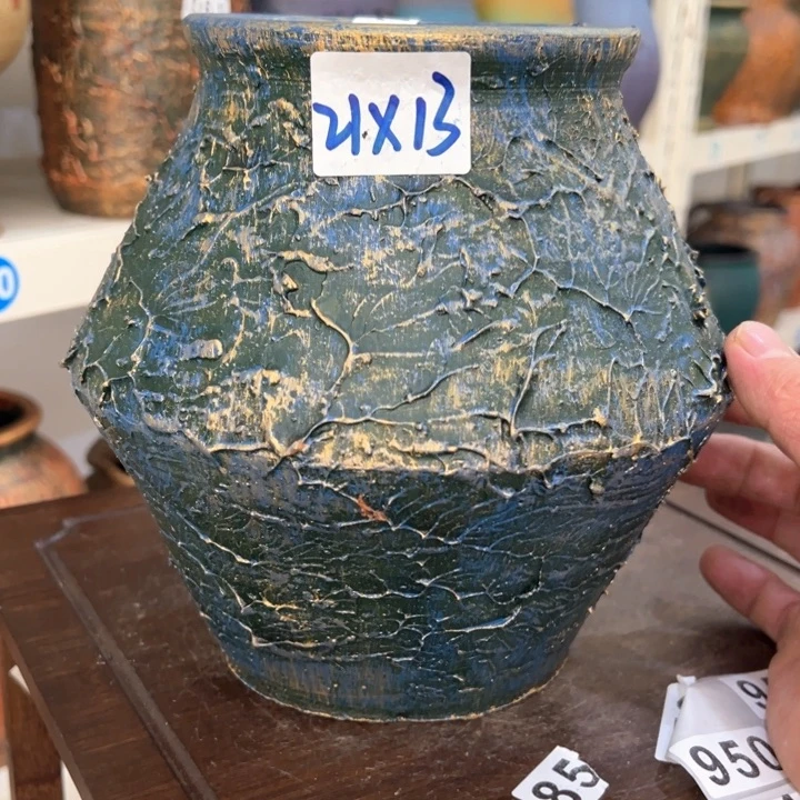 16.8-1微瑕土陶飞碟兰金