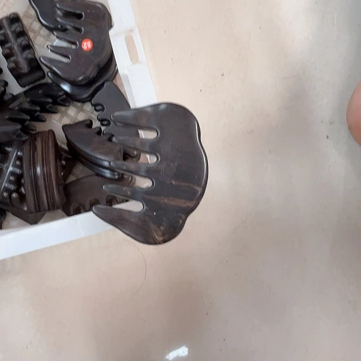 紫光檀云朵梳子瑕疵裂