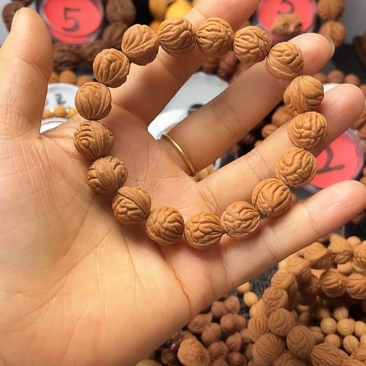 桃核吊坠小金豆手串