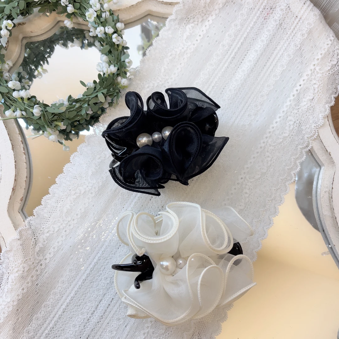 W911韩系设计简约大方时尚花苞丸子头抓夹